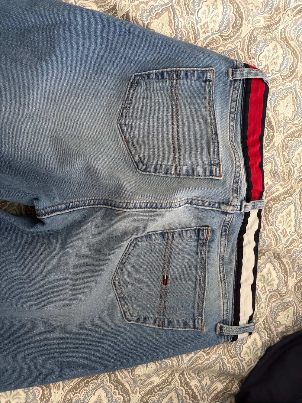 Light Wash Denim Jeans with Subtle Flag Logo
